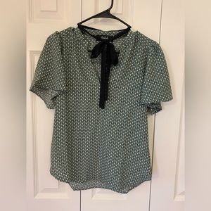 Lipslide green patterned blouse with black attached neck tie. Great condition.